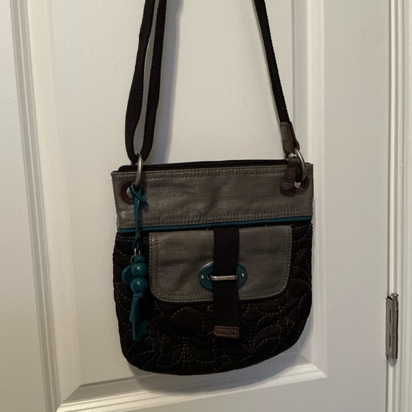 Fossil Crossbody Bag. Black with gray and turquoise trim. Adjustable strap - Picture 3 of 6
